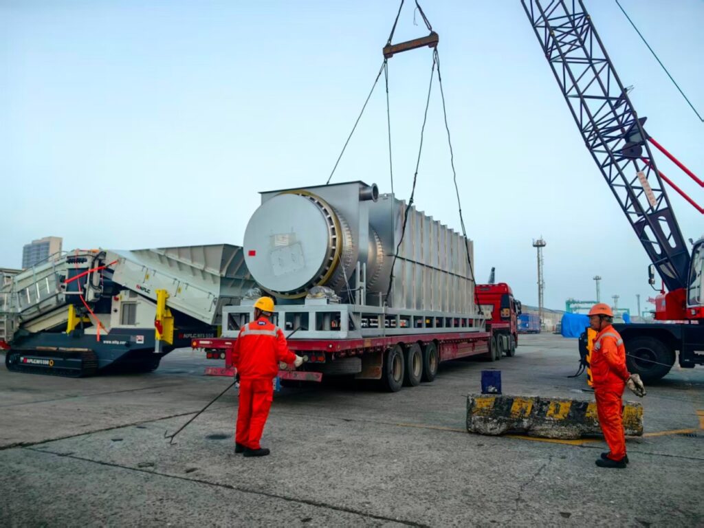 Heavy project cargo handling of an RDF Drying Production Line at Surabaya Port before shipment, illustrating Indonesia's maritime logistics and project cargo operations.